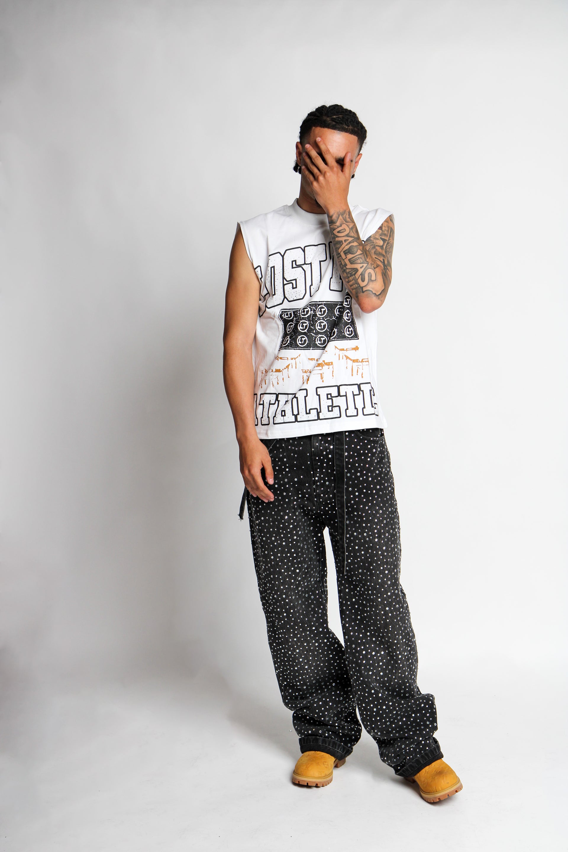 WHITE SLEEVLESS SHIRT